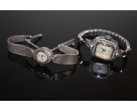 A HALLMARKED SILVER MARCASITE SET ELO LADIES WRISTWATCH TOGETHER WITH A TIMEX EXAMPLE (2)