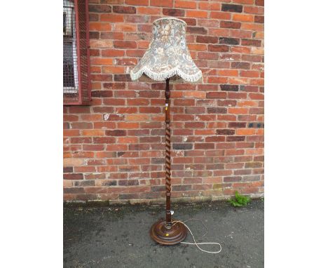A VINTAGE OAK BARLEY TWIST STANDARD LAMP WITH FLORAL SHADE
