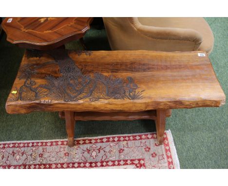 Carved plank top coffee table decorated with Rabbits and Badger signed G Solf 