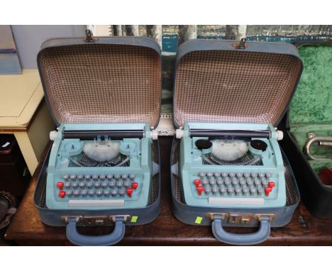 2 Cased Vintage Petite Typewriters 