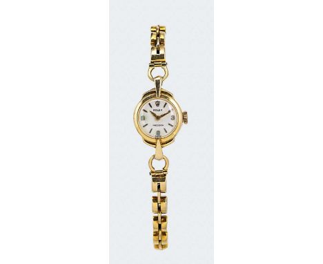 Rolex - A 9ct gold 'Precision' wristwatch with an aftermarket 9ct gold bracelet, circa 1956, circular cream coloured 'explore