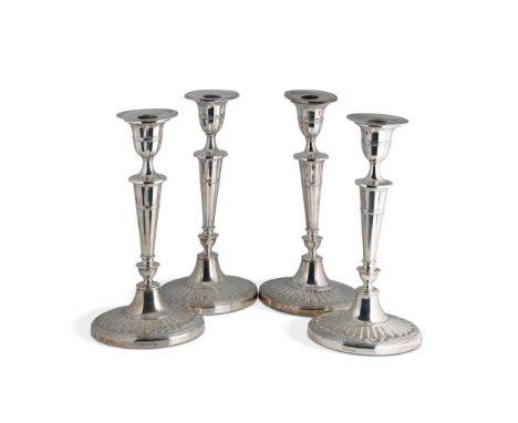 A visual set of 4 Victorian and later silver candlesticks, comprising a pair with mark of William Hutton &amp; Son, London 18