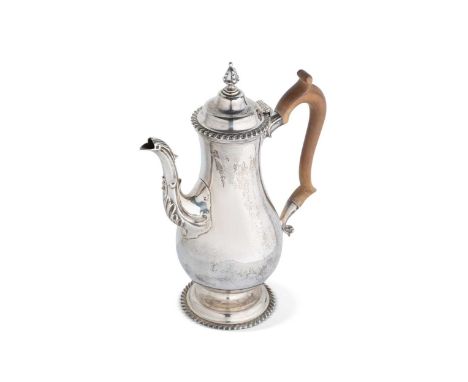 An Elizabeth II silver coffee pot, mark of Nayler Brothers, London 1968, of plain baluster form with decorated spout, piano h