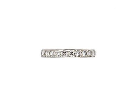 A diamond set full eternity ring, twenty three grain set round brilliant cut diamonds, estimated approximate total diamond we