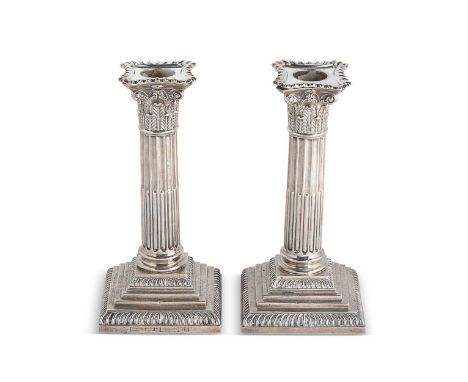 A pair of Victorian silver library candlesticks, mark of the Goldsmiths' &amp; Silversmiths' Company (William Gibson &amp; Jo