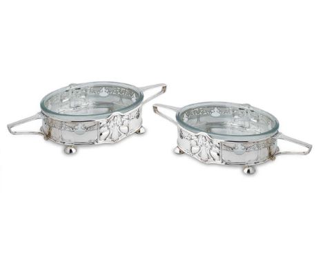 A pair of Victorian silver Art Nouveau vegetable dishes,  mark of the Goldsmiths' & Silversmiths' Company, London 1900, each 
