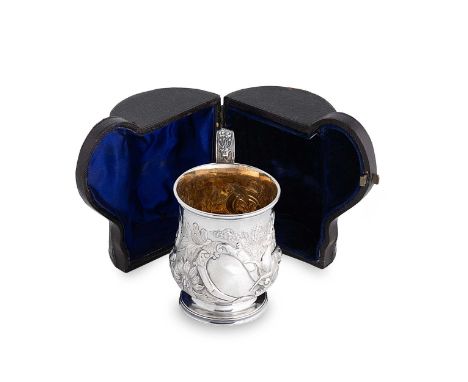 A cased George IV silver Christening mug,  mark of William Eaton, London 1827, of slightly baluster form, decorated with repo