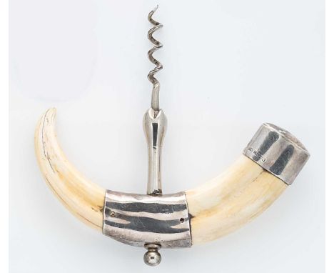An early 20th century silver and tusk corkscrew, retailed by Asprey, mark of Grey &amp; Company, Chester 1927, the curved boa