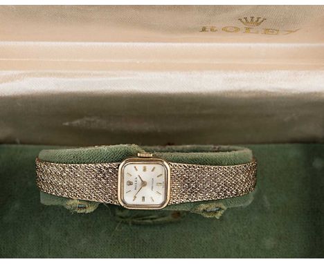 Rolex - A 9ct gold 'Precision' wristwatch, circa 1970, model number 88382, square silvered dial with gold coloured batons and