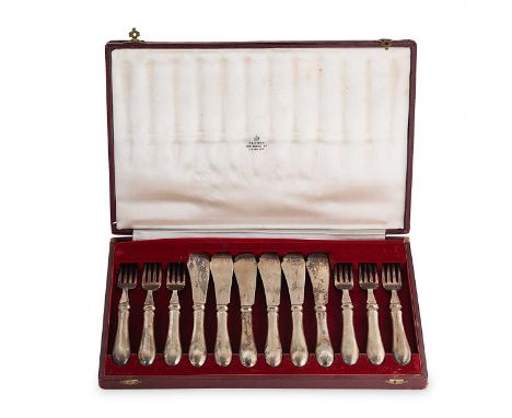 A set of 6 mid 20th century silver fish eaters, cased by Asprey, mark of William Comyns &amp; Sons Ltd. (Richard Comyns), Lon