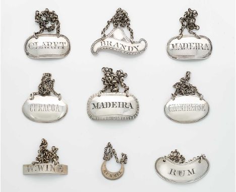 A collection of 9 George III and later silver bottle labels, including a pair with mark of Wright &amp; Davies (William Thoma