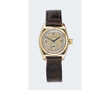 Rolex - A 9ct gold 'Oyster Perpetual' wristwatch, circa 1931, circular two-tone dial with trois Arabic numerals, blued hands 