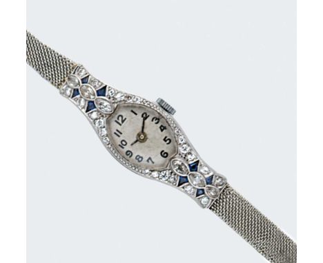 Unsigned - A diamond and sapphire set cocktail watch, circa 1950, oval cream coloured dial with black Arabic numerals and han
