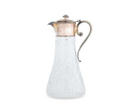 An Elizabeth II silver mounted glass claret jug, mark of Asprey & Company, Birmingham 1994, tapering deep cut glass body, sil