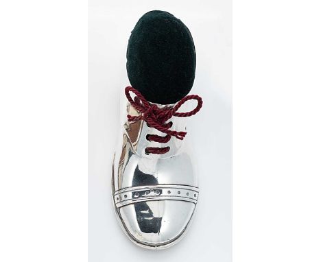 An early 20th century silver novelty pin cushion, mark of S. Blanckensee &amp; Son Ltd., Birmingham 1911, in the form of a sh