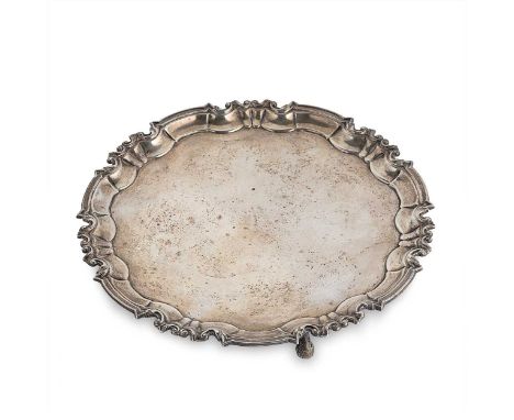 An Edward VII silver salver, mark of William Hutton &amp; Sons, London 1909, ‘Chippendale’ style with decorative scrolled rim