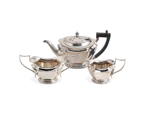 A George V silver 3-piece tea set, mark of Britton, Gould &amp; Company, Birmingham 1930, the teapot of plain, oval panelled 