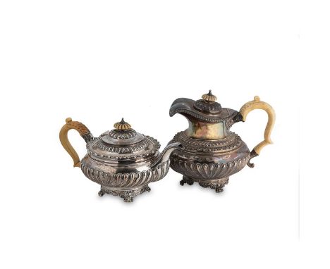 A George III silver teapot and hot water jug, mark of George Burrows II, London 1819, the pot of circular form, lower gadroon