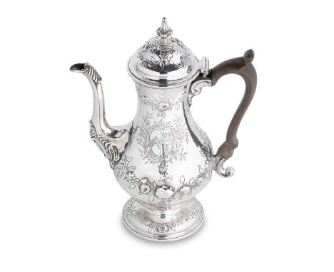 A George II silver coffee pot, mark of Thomas Whipham &amp; Charles Wright, London 1759, of baluster form with repoussé folia