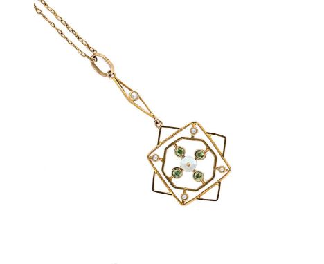 An early 20th century peridot and pearl pendant and chain, central mother of pearl disc, with four round faceted peridot's se