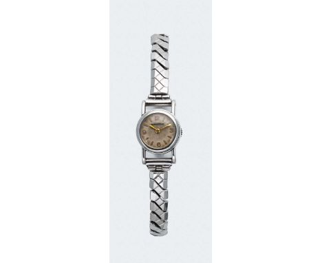 Jaeger-LeCoultre - A steel wristwatch, circa 1950, model number 386664, serial number 4789, circular cream-coloured dial with