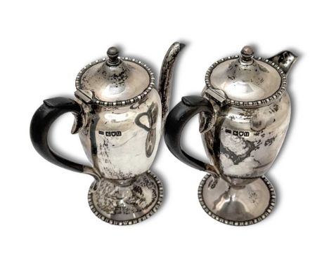 A George V silver 2-piece café au lait set, mark of Harrison Brothers &amp; Howson (George Howson), London 1915, each of urn 