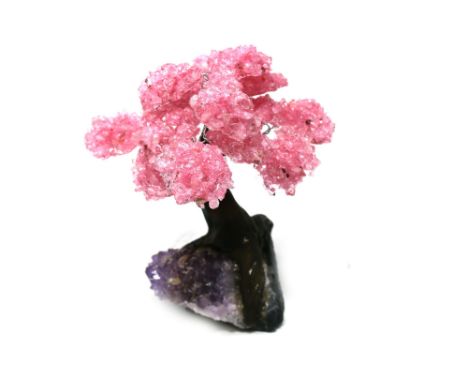 Interior Design/Minerals: A rose quartz tree with fifteen petals, on amethyst and composition base,18cm high
&nbsp;
Interior 
