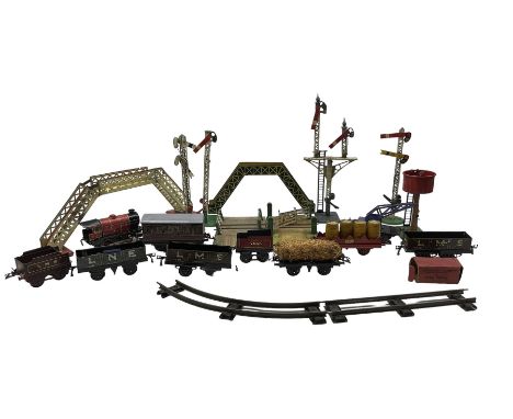 Hornby O gauge model railway including 0-4-0 tank locomotive and tender, rolling stock, accessories and track