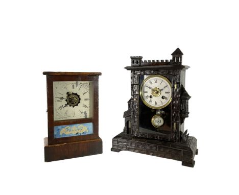 A German and American 19th century 30-hour alarm clock - German Bavarian carved case with a crenellated top and decorative tu