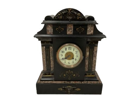 French - 19th-century 8-day mantle clock in a Belgium slate and marble case, with a round top and volutes, incised gilt decor