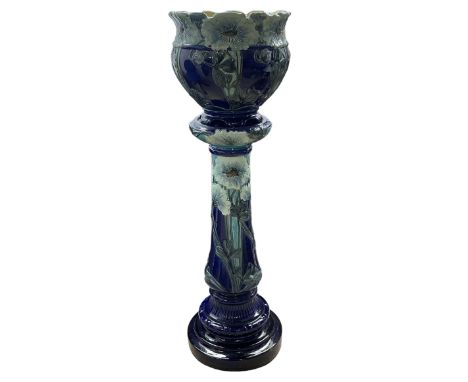 Art Nouveau Burmantofts Faience jardiniere and stand circa 1900, modelled in relief with pale blue flowers and foliage on a t