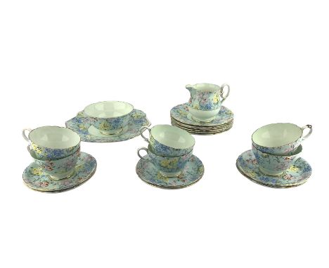 Shelley Melody pattern tea set decorated with flowers comprising six cups and saucers, six plates, milk jug, sugar bowl and c