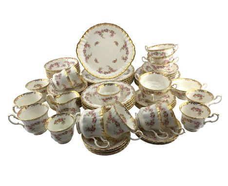 Royal Albert Dimity Rose pattern dinner and tea service comprising seven dinner plates, seven side plates, eight breakfast bo