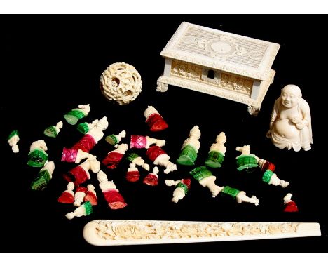 A Chinese Canton Export pierced ivory casket, 12cms (4.75ins) wide; together with an early 20th century carved ivory Buddha; 