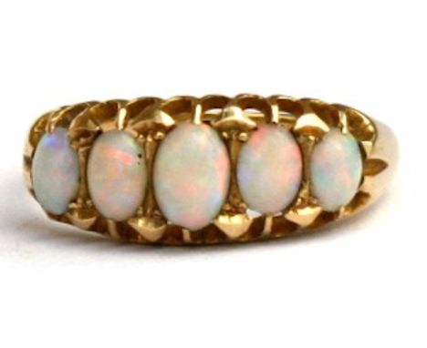 An 18ct gold five-stone opal ring, approx UK size 'P'.