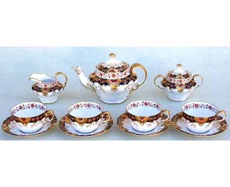 A Copeland Spode part tea service, pattern no. 9211, decorated in the Imari palate.Condition ReportOne cup has a small chip t