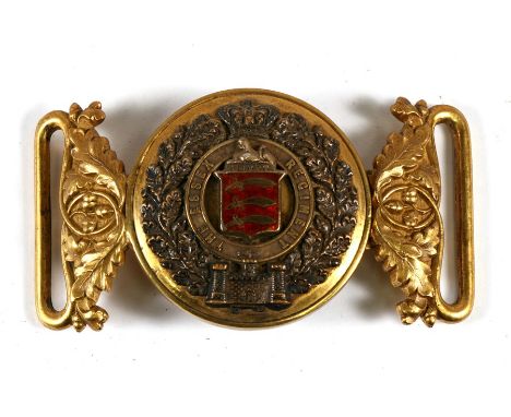 A Victorian officers Essex Regiment two part gilt and enamel belt buckle. Overall width 9.5cms (3.75ins)