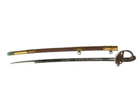 A Victorian officer's dress sword with VR cypher on both the blade and folding knuckle guard with sharkskin grip and brass mo