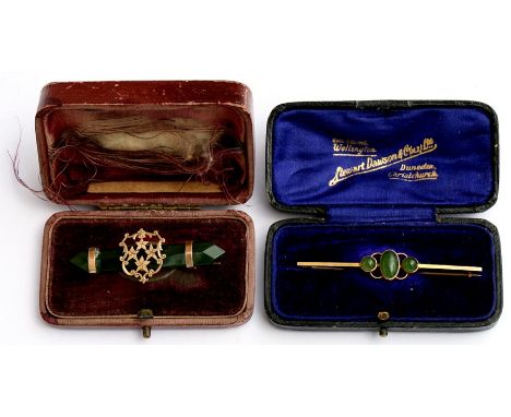 A 9ct gold bar brooch set with three jade cabochons in original box; together with another similar (2).