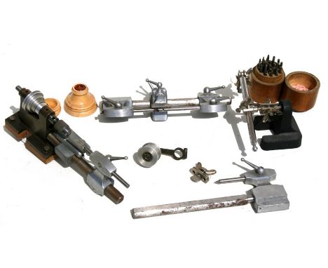 A quantity of watch maker or jewellers lathes and tools.
