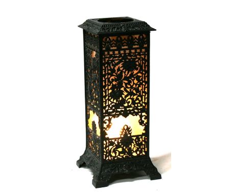 A Victorian pierced cast iron stove (converted to a lamp), 69cm (27ins) high.