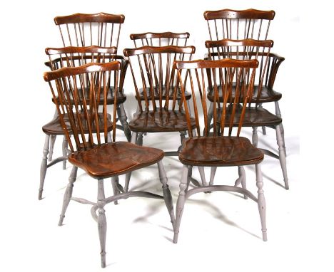 A set of eight 18th century style comb back dining chairs, six chairs and two carvers, by Dodge of Sherborne