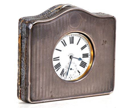 An early 20th century nickel plated Goliath open face pocket watch, the white enamel dial with Roman numerals and subsidiary 