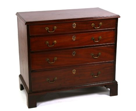 A Georgian mahogany chest with four long graduated drawers standing on bracket feet, 88cm (34.5ins) wide.