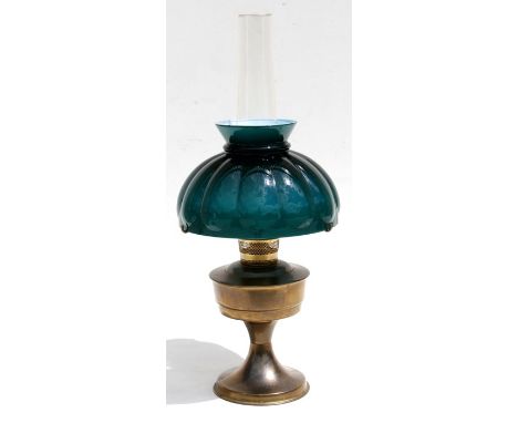A brass oil lamp (converted to electricity).
