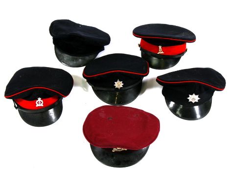 Six vintage military caps including Worcestershire Regiment, Cheshire Regiment, Royal Hussars, Royal Pioneers and the Labour 