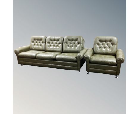 A 20th century three-seater green leather button settee and matching armchair 