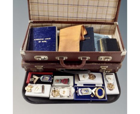 A collection of Masonic memorabilia, two cases, booklets, lodge sash, medals etc. 