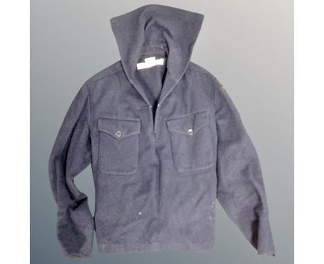 A vintage military tunic with later No. 3 Commando patch