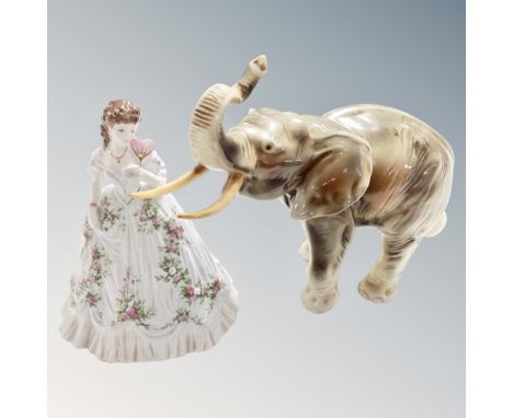 A Royal Dux figure of an elephant (a/f) together with a further Royal Worcester limited edition figure, Queen of Hearts. 